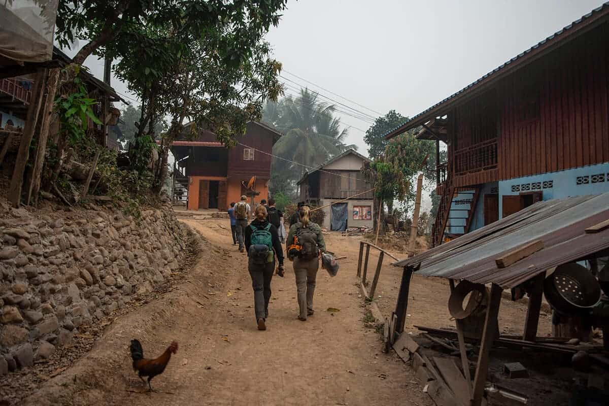 hiking in a quiet rural village scams in laos
