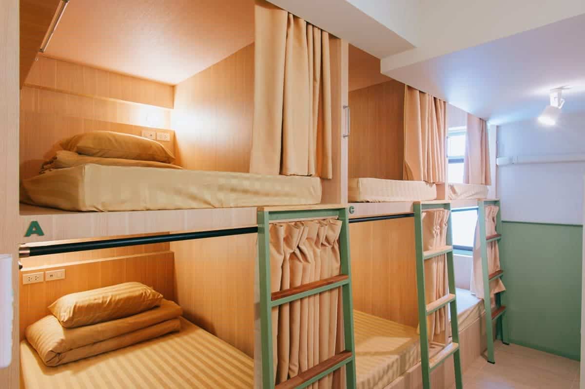 muan hostel dorm beds with privacy curtain