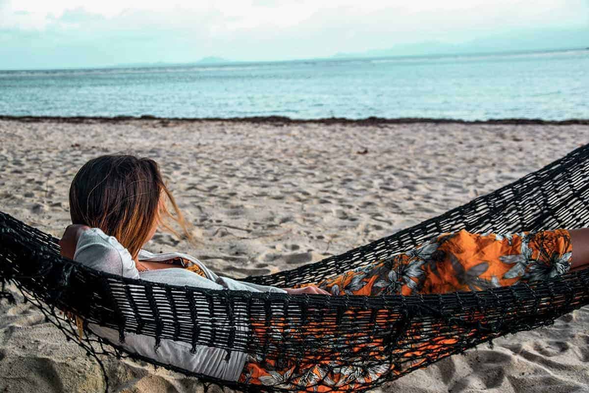 hammock chilling at the beach while backpacking koh phangan