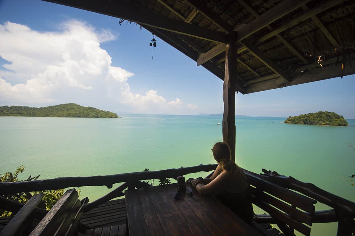 looking out to sea while backpacking thailand on a budget