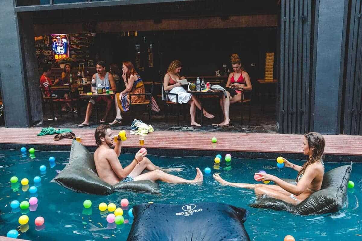 bed station hostel pool party with toys