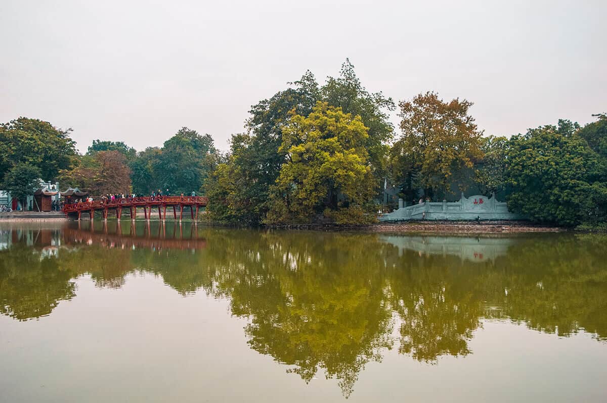 ho hoan kiem lake in hanoi with the bridge leading to the temple in the middle