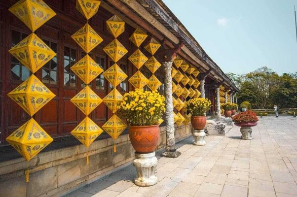 beautiful decorations on the buildings inside the imperial city backpacking hue on the 2 days in hue itinerary