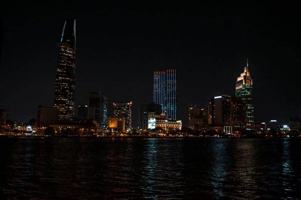 ho chi minh city by night on our free motorbike tour