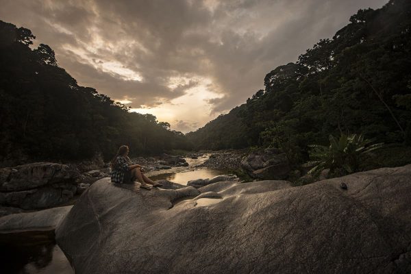 experiencing sunset on a stormy afternoon at pico bonito national park