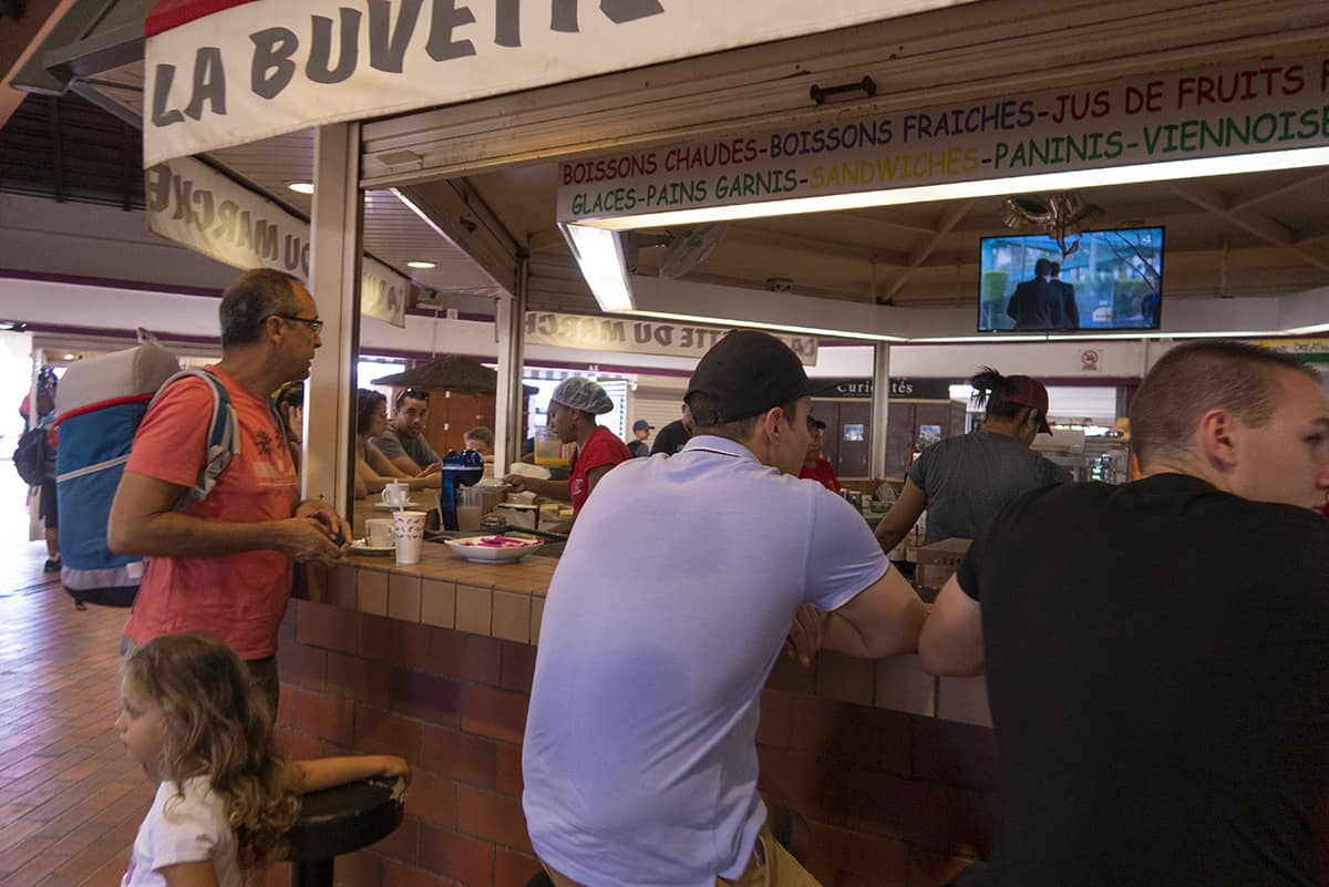 grabbing some delicious food from the port moselle markets