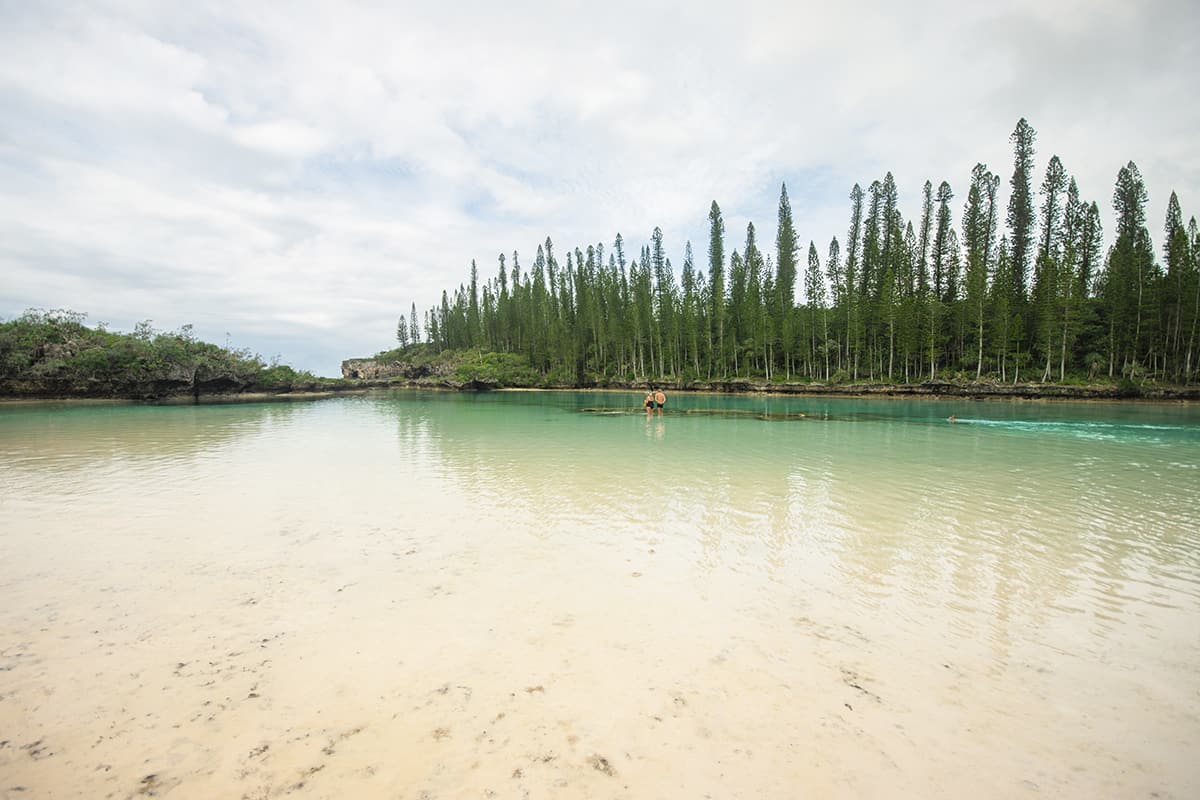 Isle Of Pines Natural Pool: Why You NEED To Visit 2023 22 looking out to the other part of the natural aquarium where it meets the ocean