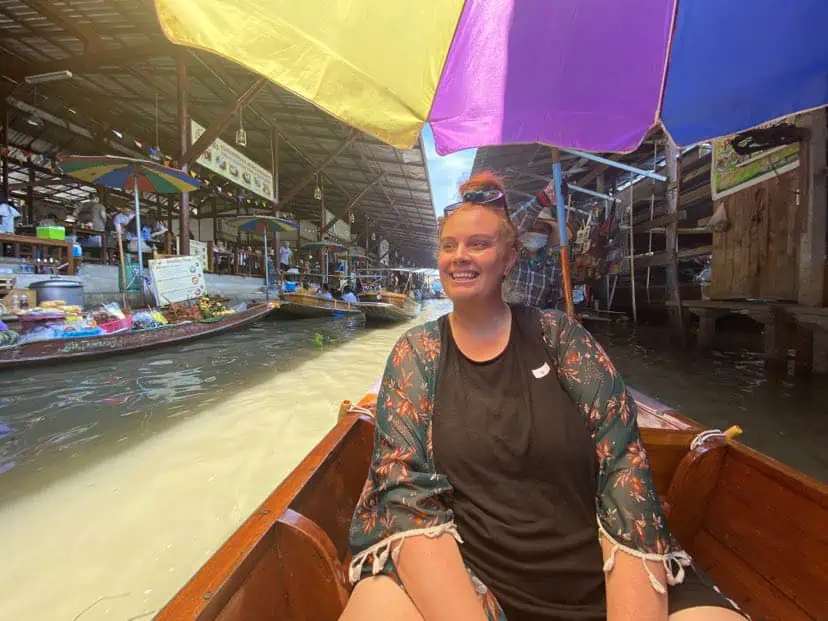 2 Days In Bangkok Itinerary: How To Spend The Ultimate 48 Hours In Bangkok 30 tasha amy on a boat at the Damnoen Saduak floating Market in bangkok