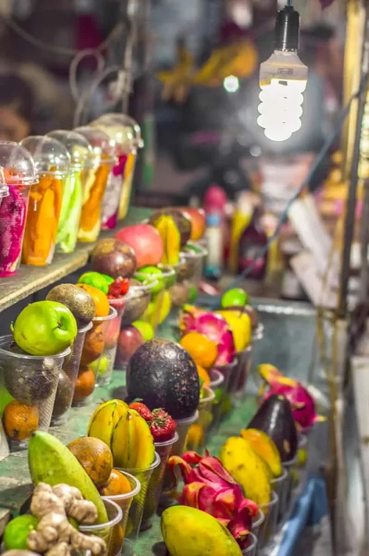Chiang Mai To Luang Prabang: Slow Boat, Bus Or Flight? 44 delicious glasses of fruit waiting to be made into smoothies at the luang prabang night market