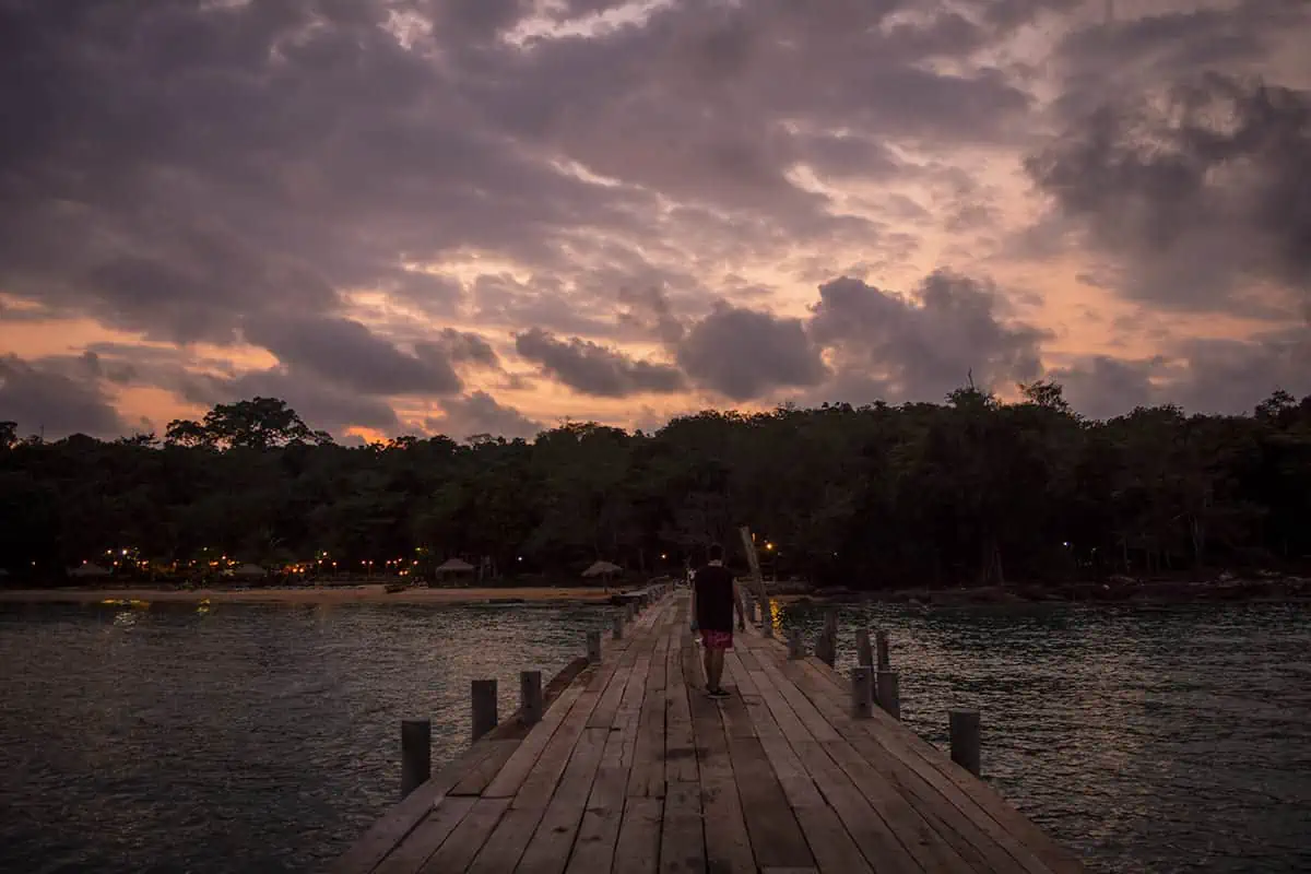 Koh Rong Or Koh Rong Samloem: Which Island Is Best For Your Getaway? 41 walking back down the pier at sunset to our bungalow on koh rong