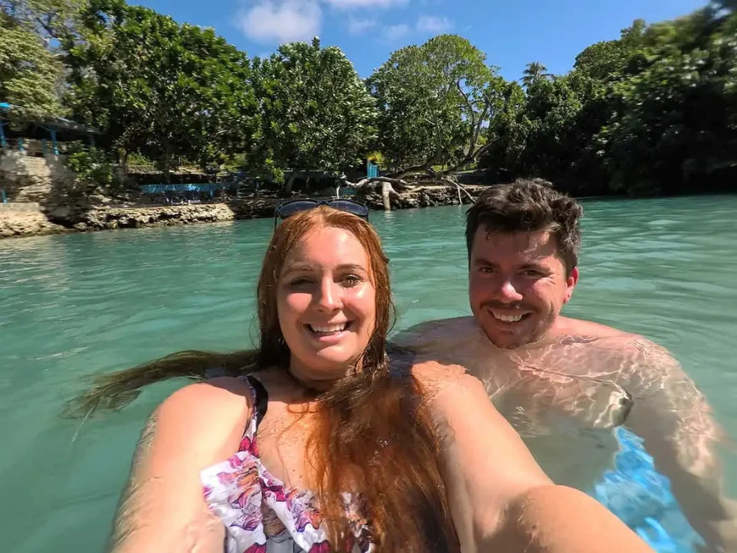 Port Vila Blue Lagoon: BEST Tips For Visiting 2026 16 a cheeky selfie of tasha amy and james while swimming in the blue lagoon in port vila vanuatu
