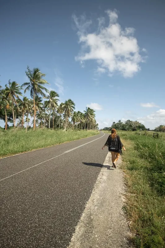 Port Vila Blue Lagoon: BEST Tips For Visiting 2026 9 tasha amy walking along the side of the road after our van broke down in port vila