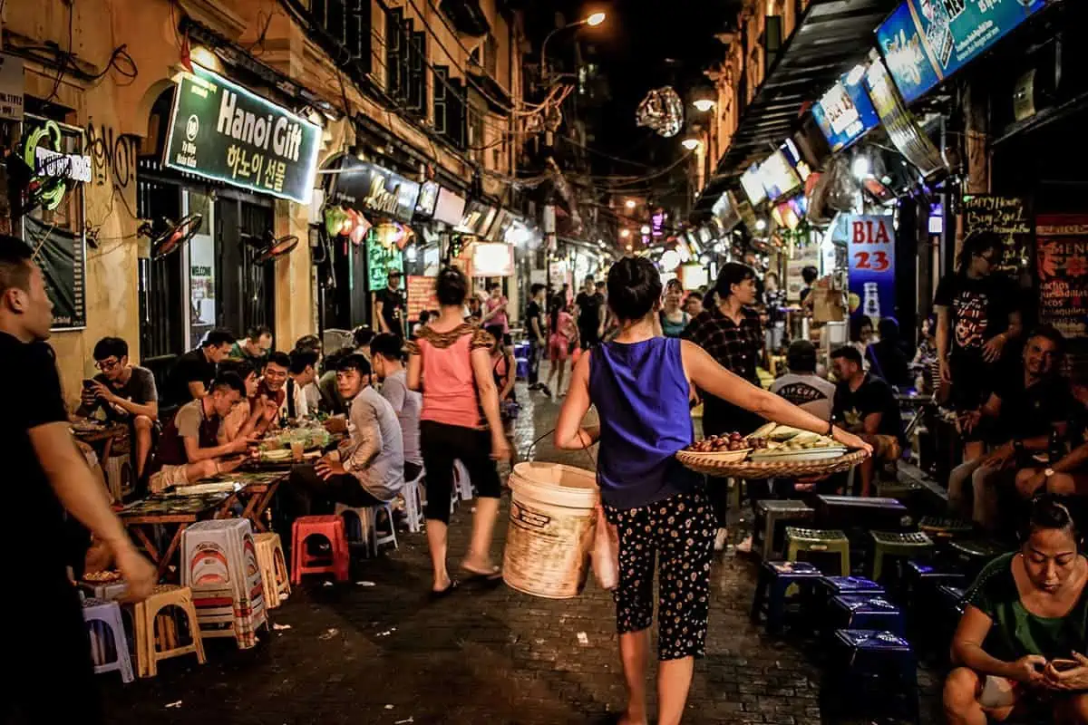 Scams In Vietnam: READ BEFORE YOU VISIT (2023) 23 busy street in hanoi by night