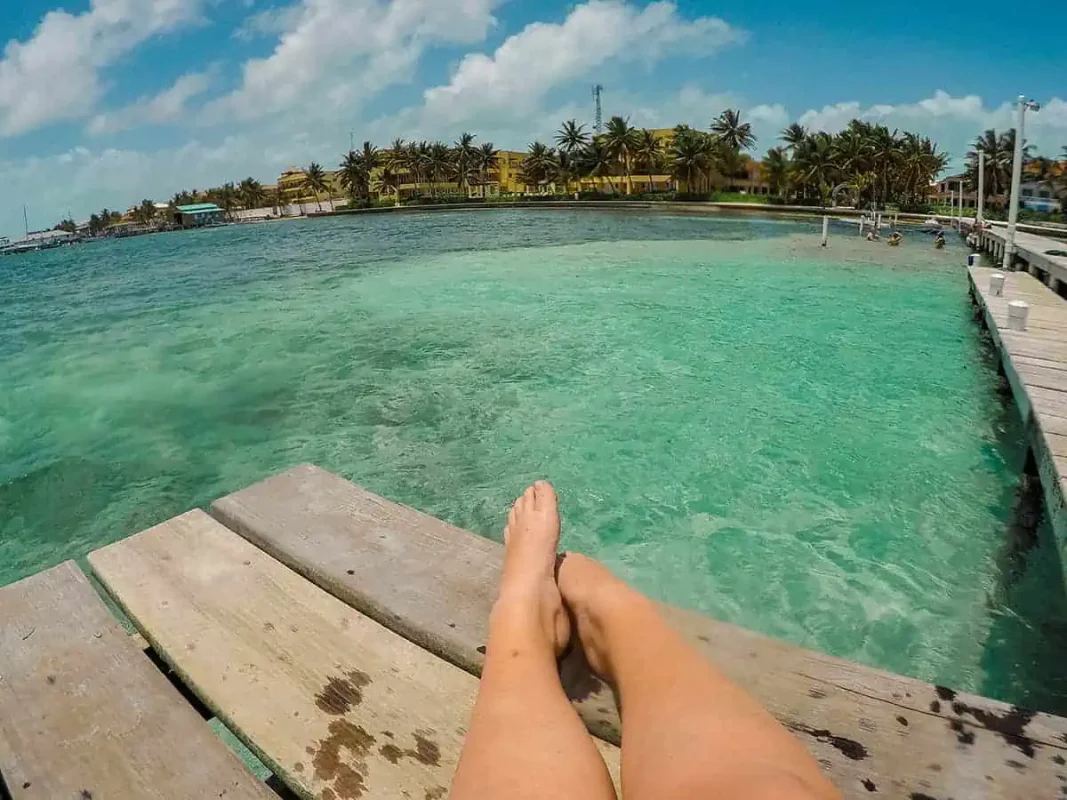 1 Week In Belize Itinerary: BEST 7 Days In Belize 4 hanging out on one of the piers in san pedro while on the 1 week in belize itinerary