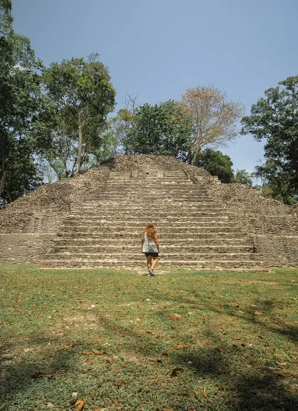 Cahal Pech Mayan Ruins In San Ignacio: A Hidden Gem Away from the Crowds 56 tash amy walking towards the ruins at cahal pech in san ignacio