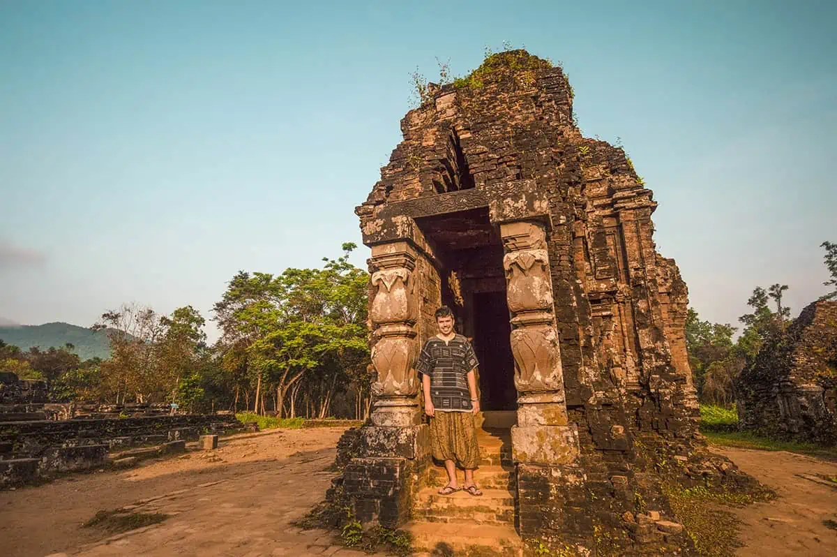 My Son Sanctuary Hoi An: BEST Tips & Tours (2026) 59 a man in front of one of the temples at my son sanctuary