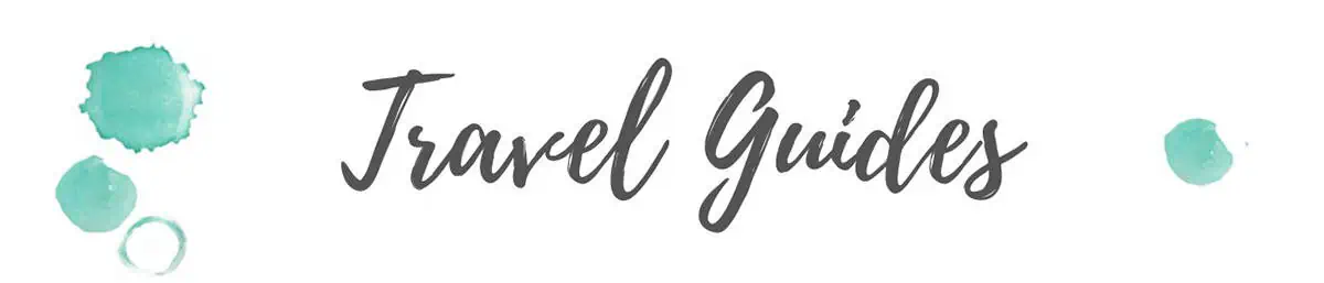 Backpackers Wanderlust 56 home page travel guide header for backpackers wanderlust with blue watercolor marks on each side