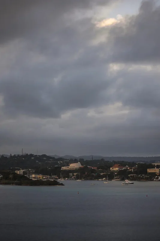 Vila Vanuatu Cruise Port: What To Know And Best Things To Do 15 stormy skies rolling over while looking over at port vila from our cruise ship