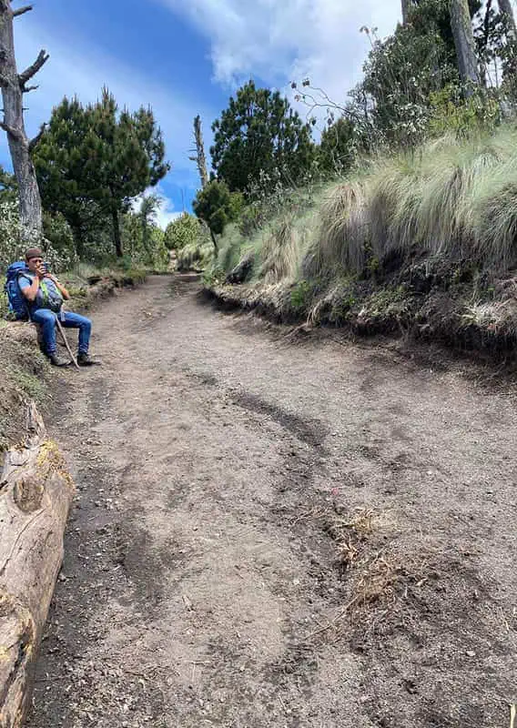 Acatenango Volcano Hike Difficulty: My Honest Experience 34 having a rest stop on the road portion of the acatenango volcano hike