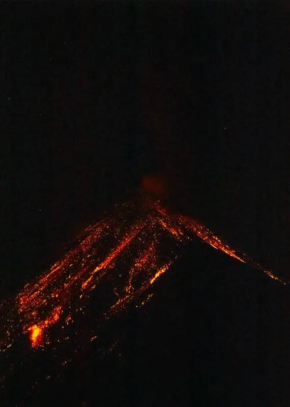Acatenango Volcano Hike Difficulty: My Honest Experience 36 lava lighting up the sky from fuego volcano at night