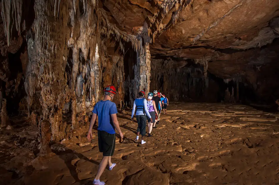 ATM Cave Tour From San Ignacio: Is It REALLY Worth The Price? 64 hiking through a more open and flat section on the atm cave tour belize