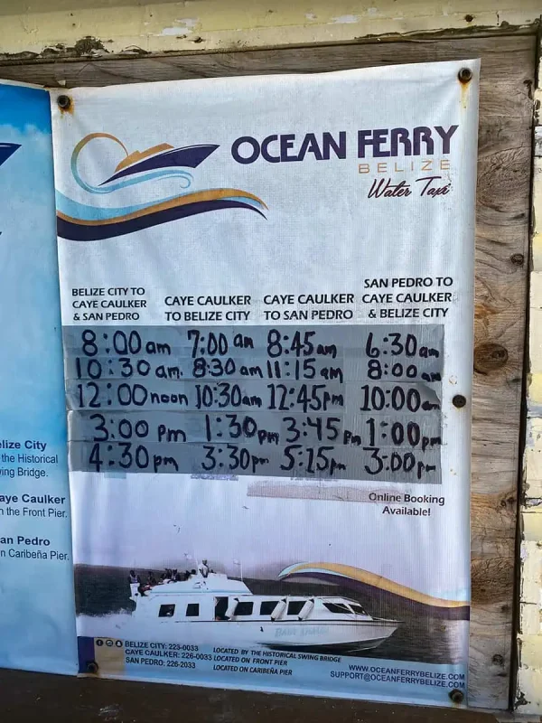 ATMs In Caye Caulker: Locations, Accepted Cards & All Money Matters 58 ocean ferry sign in caye caulker showing the ferry routes and times
