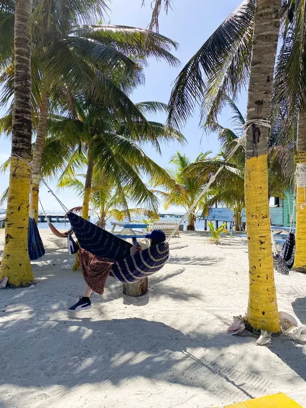 ATMs In Caye Caulker: Locations, Accepted Cards & All Money Matters 59 hanging out on a hammock in caye caulker
