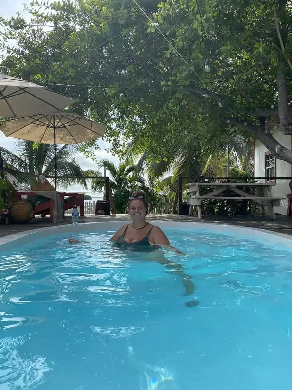 Backpacking Belize: The BEST Guide For Travelers 2026 62 enjoying the pool at our guesthouse in san pedro