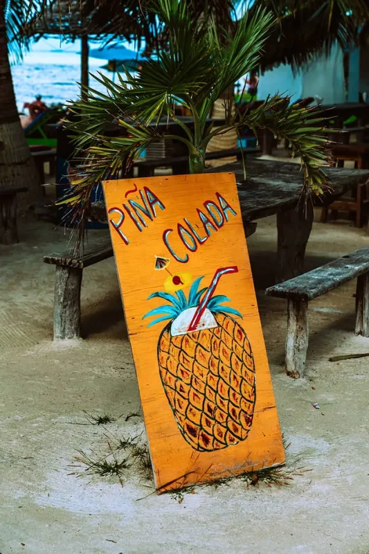 Backpacking Belize: The BEST Guide For Travelers 2026 74 you cant go wrong with a delicious pina colada when in belize