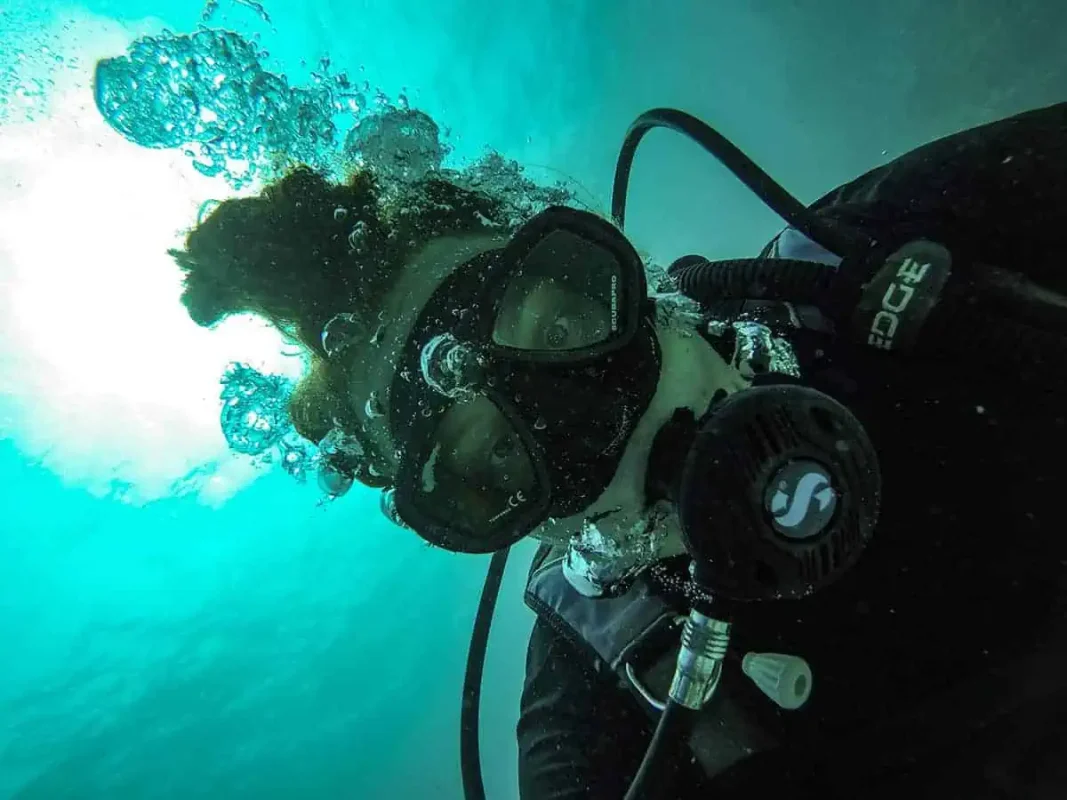 Backpacking Belize: The BEST Guide For Travelers 2026 67 tasha amy diving in ambergris caye belize