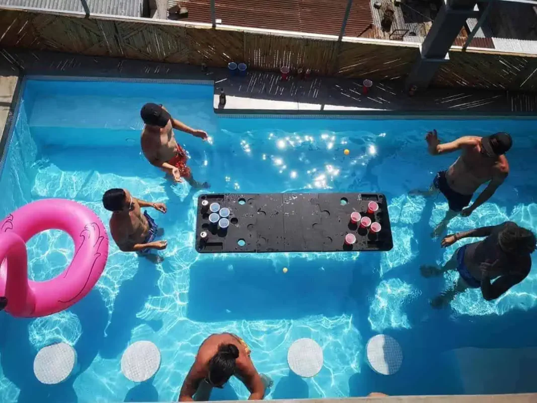 Best Hostels In Lake Atitlan: My Favorites Around The Lake 34 beer pong in the pool at the social dreamboat hostel in panajachel
