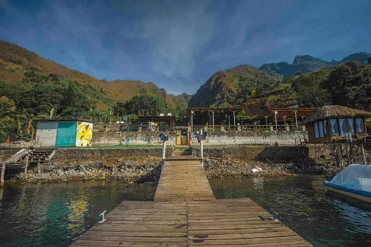 from the private pier looking back toward free cerveza one of the best hostels in lake atitlan