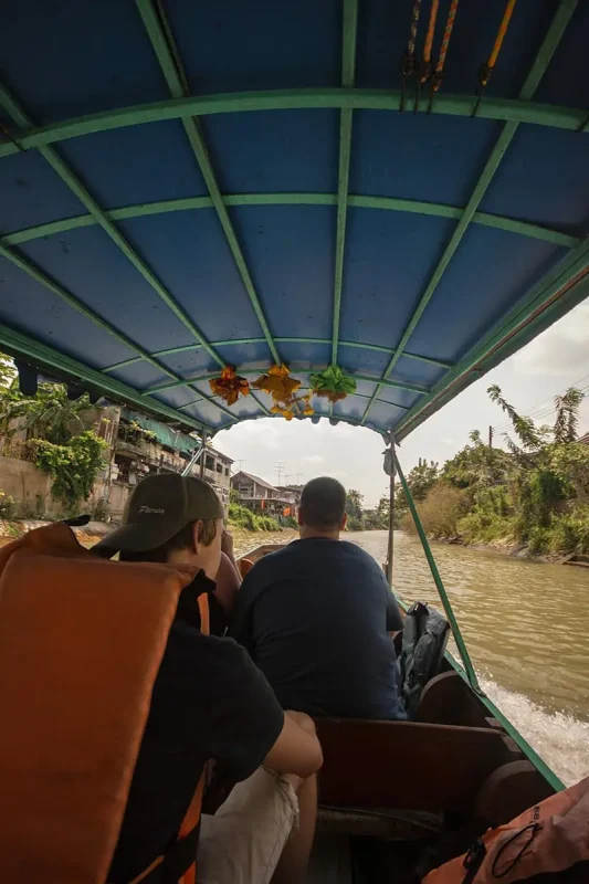Ayutthaya Day Trip From Bangkok: BEST Guide (2026) 60 taking a boat through the canals on our ayutthaya day trip