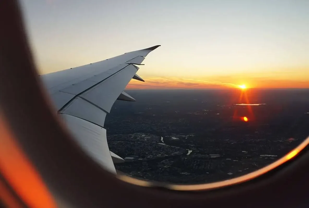 Luang Prabang To Vang Vieng: Train, Bus Or Shuttle? 37 sunset from plane window over laos