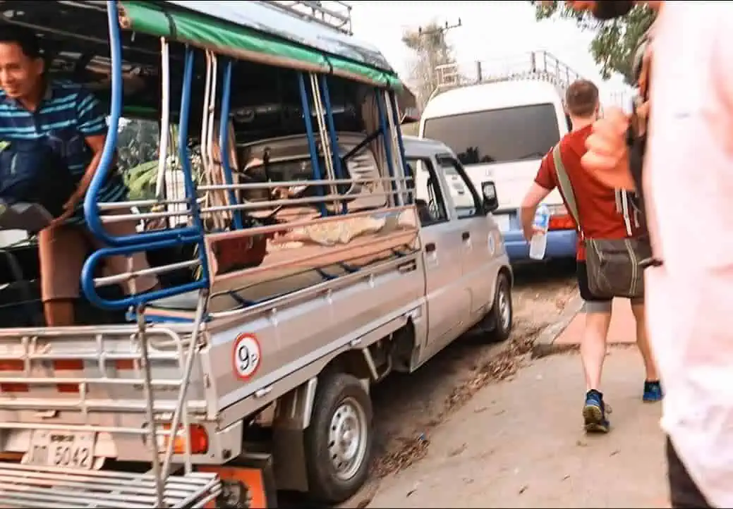 Luang Prabang To Vang Vieng: Train, Bus Or Shuttle? 33 changing from tuk tuk to bus in luang prabang