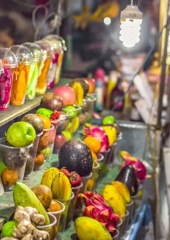 delicious glasses of fruit waiting to be made into smoothies at the luang prabang night market