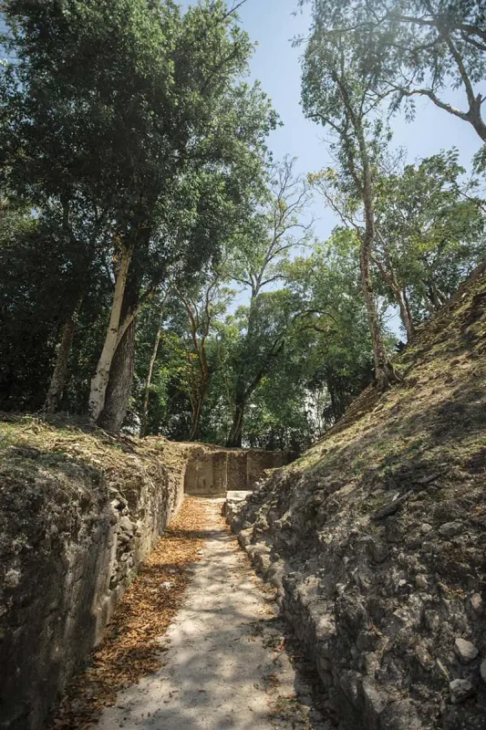 exploring the many walkways around the cahal pech mayan ruins