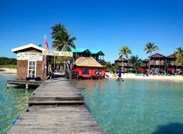 Best Beaches In Ambergris Caye For Swimming & Snorkeling 61 Standing on the pier at X'tan Ha Resort looking towards the beach.