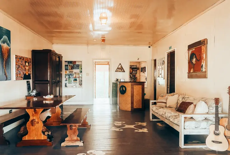 Best Hostels In San Ignacio: 5 Excellent Stays For Travelers On A Budget 55 Spacious and homely common area with artistic decor and comfortable seating at Old House Hostel, known as one of the best hostels in San Ignacio.