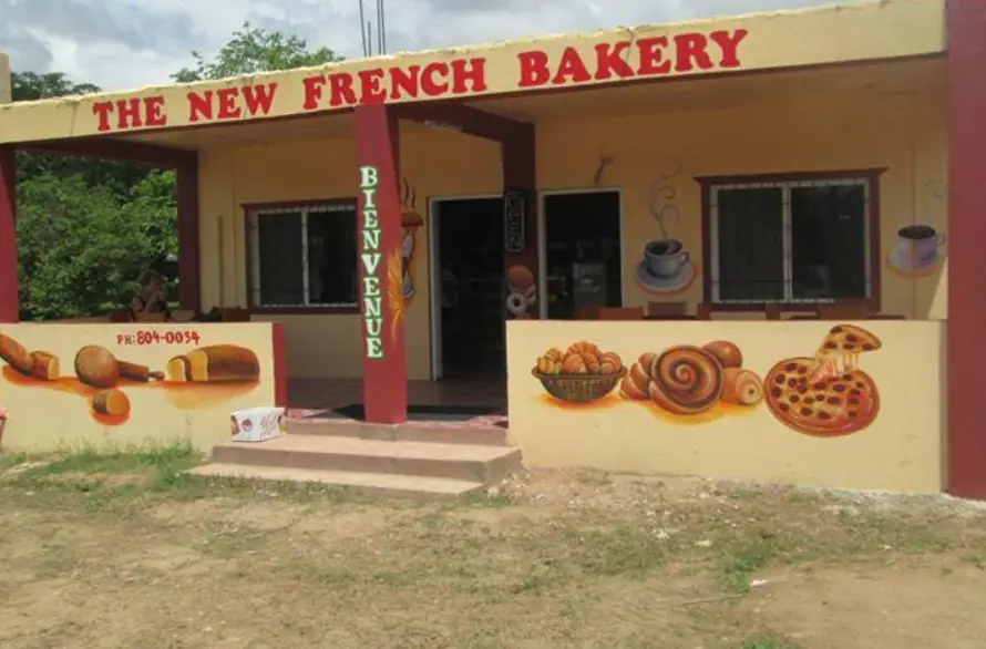 12 Best Restaurants In San Ignacio: Top Eats For Visitors 57 The New French Bakery in San Ignacio, its storefront painted with colorful depictions of baked goods, welcoming visitors to enjoy fresh pastries.