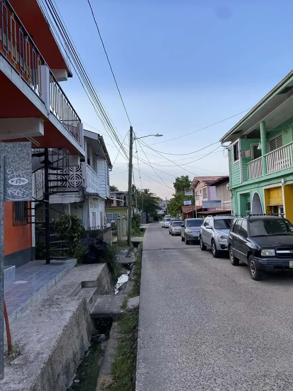 San Ignacio To Tikal & BEST Tikal Tours From San Ignacio 59 The quiet roads of San Ignacio lined with colorful houses and parked cars, the starting point for travelers heading to Tikal.