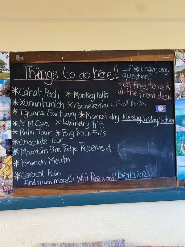 San Ignacio To Tikal & BEST Tikal Tours From San Ignacio 58 A chalkboard list of activities in San Ignacio, including tours to local attractions, showcasing the variety of adventures in the area.