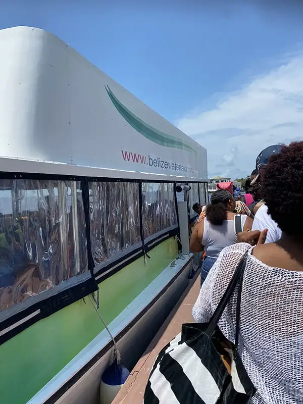 Chetumal To Caye Caulker: Best & Easiest Transport 2026 55 Passengers waiting to board the Belize Water Taxi at the dock in Chetumal.