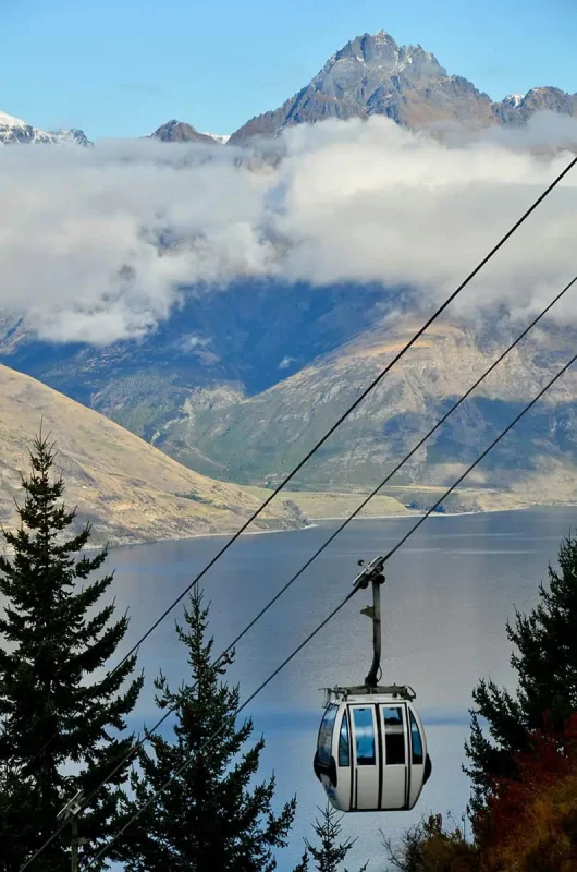 Fiordland & Milford Sound Lord Of The Rings Locations (2026) 29 A gondola above Lake Wakatipu with mountain peaks in the distance