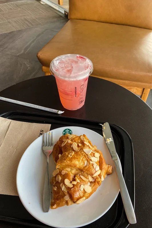 2 Days in Bangkok Itinerary For First-Time Visitors 53 a almond croissant and strawberry acai refresher from Starbucks for breakfast in Bangkok
