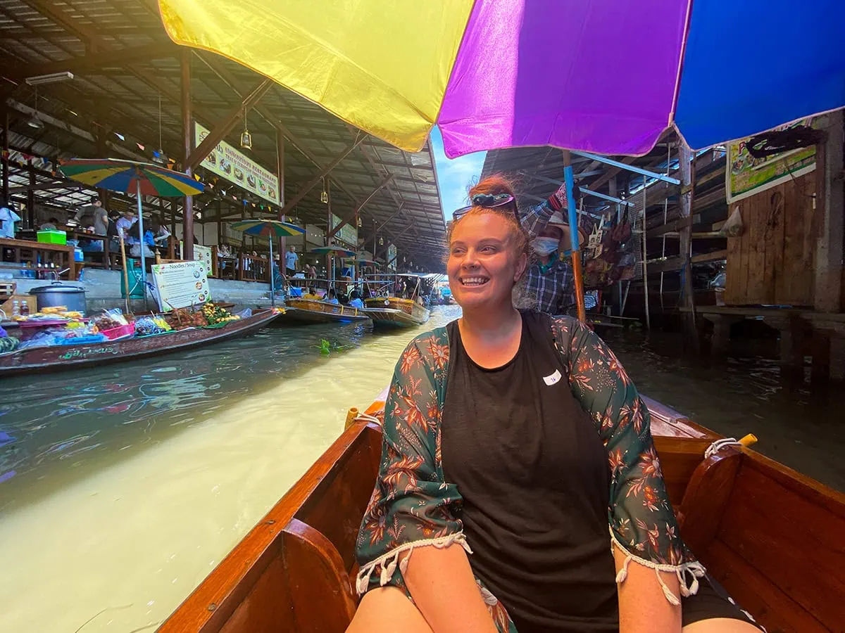 2 Days in Bangkok Itinerary For First-Time Visitors 59 Tasha Amy on a boat at the Damnoen Saduak Floating Market in Bangkok