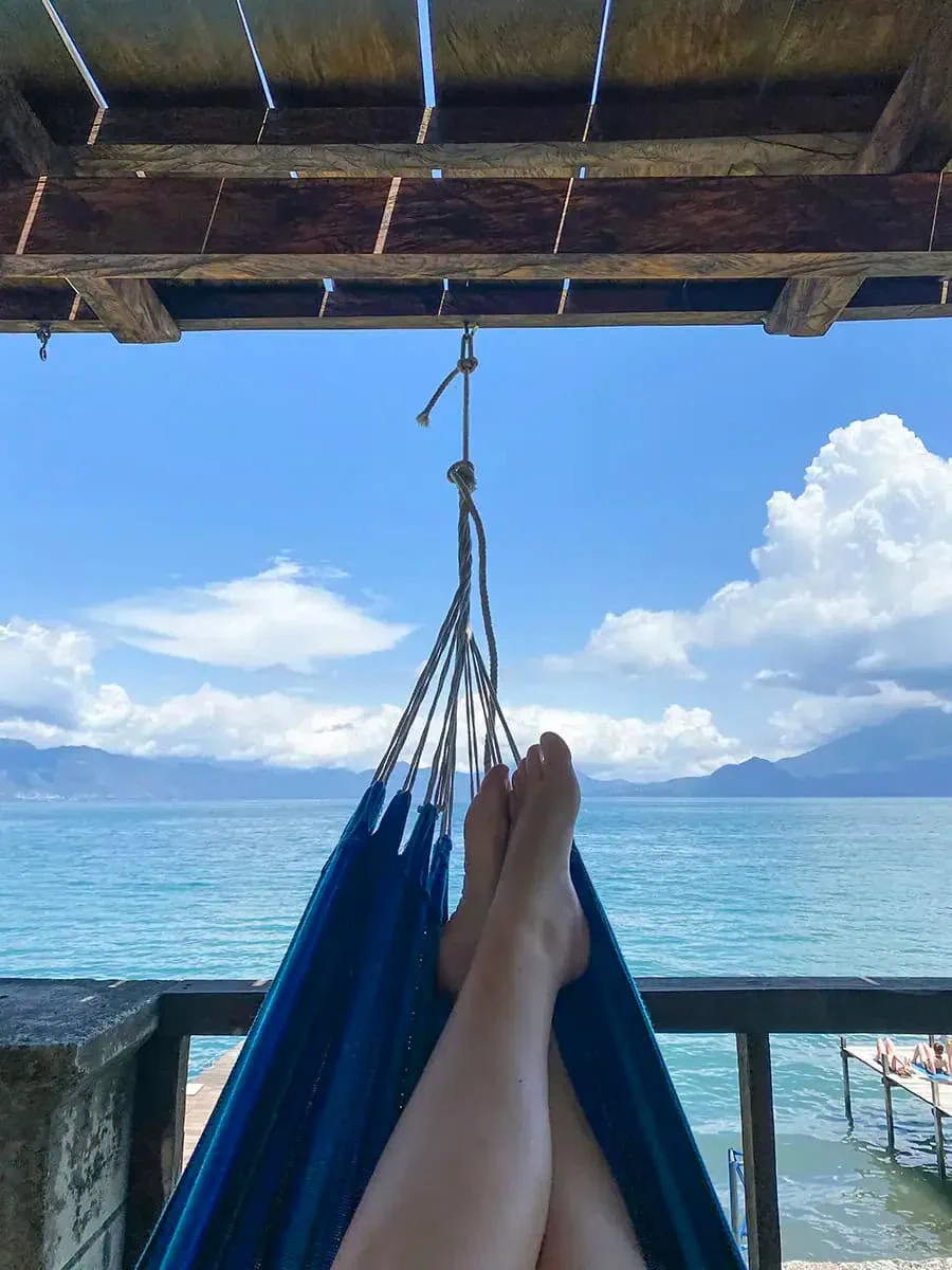 relaxing back on the hammock with views around lake atitlan