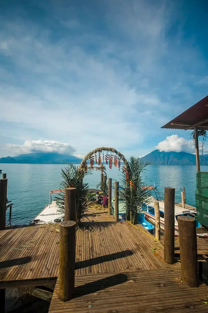 arriving at the wooden dock all decorated with flowers at Santa Cruz La Laguna in Lake Atitlan