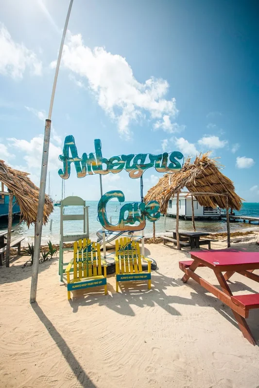Best Beaches In Ambergris Caye For Swimming & Snorkeling 63 The Ambergris Caye sign with the Central Park Beach behind it.