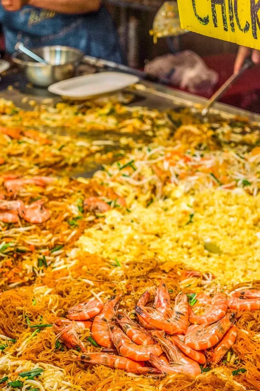 fried noodle and rice with shrimp on a grill at the Chiang Mai Sunday Walking Street Market